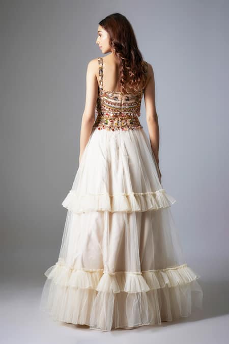 Shop Rocky Star Ivory Net Beads, Embroidery, Crystals Floral Tribal Blouse And Lehenga Set at Aza Fashions Shop_Rocky Star_Ivory Net Beads, Embroidery, Crystals Floral Tribal Blouse And Lehenga Set _at_Aza_Fashions