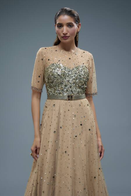 Rocky Star Beige Net Crystals, Sequins, Tassels Round Neck Embroidered Flared Gown Online at Aza Fashions Rocky Star_Beige Net Crystals, Sequins, Tassels Round Neck Embroidered Flared Gown _Online_at_Aza_Fashions