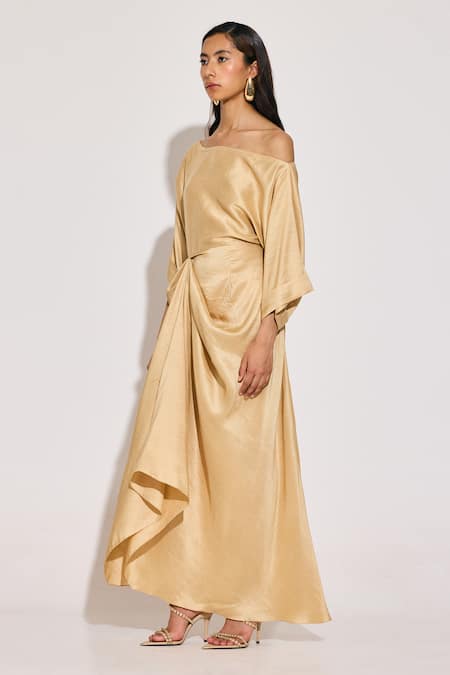 Shop Twinkle Hanspal Beige Silk One Shoulder Draped Maxi Dress at Aza Fashions Shop_Twinkle Hanspal_Beige Silk One Shoulder Draped Maxi Dress_at_Aza_Fashions