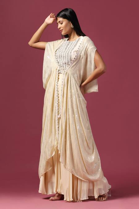 Shop_Two Sisters By Gyans_Ivory Georgette Sequins, Zari Round Neck Embroidered Cape Sharara Set _Online_at_Aza_Fashions