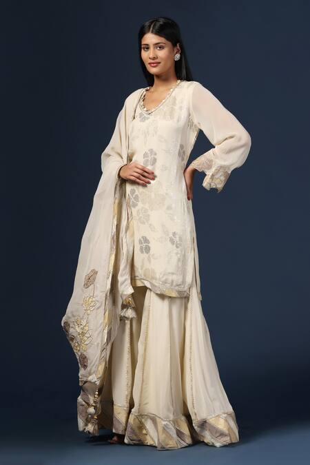 Buy Two Sisters By Gyans Off White Georgette Sequins, Applique Embroidered Floral Kurta Sharara Set Online at Aza Fashions Buy_Two Sisters By Gyans_Off White Georgette Sequins, Applique Embroidered Floral Kurta Sharara Set _Online_at_Aza_Fashions