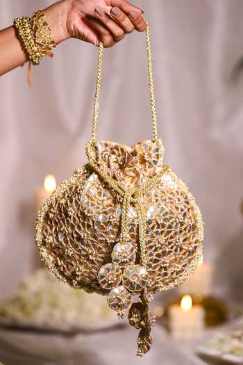 Shop 5elements Gold Embroidery Floral Gota Patti Potli Bag at Aza Fashions Shop_5elements_Gold Embroidery Floral Gota Patti Potli Bag _at_Aza_Fashions