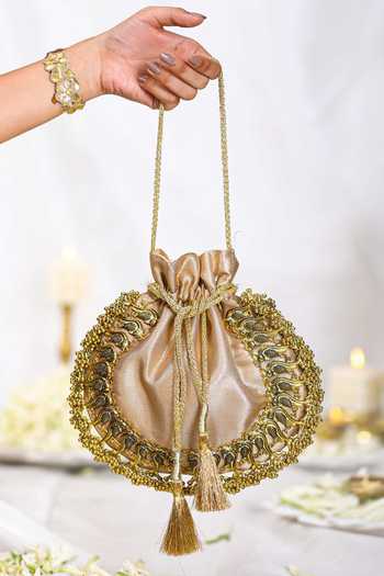 Shop 5elements Gold Pearls, Gota Patti Brocade Potli With Peacock Embellishments at Aza Fashions Shop_5elements_Gold Pearls, Gota Patti Brocade Potli With Peacock Embellishments _at_Aza_Fashions