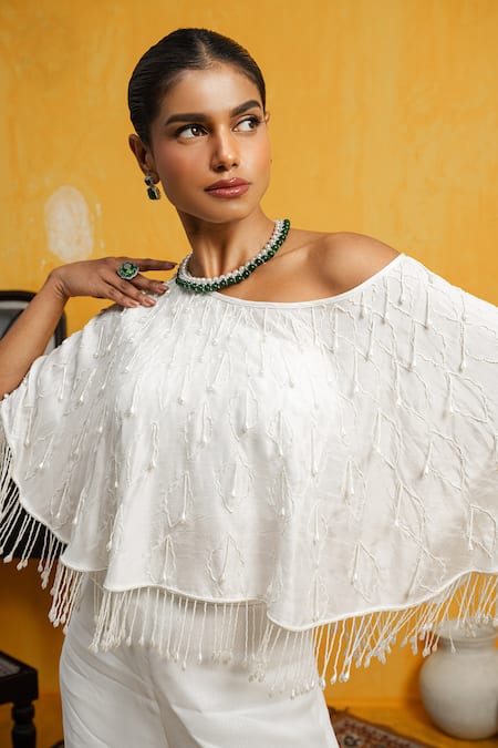 Day And Mood White Silk, Georgette Pearls, Cut Work One Cape Top And Bell Bottom Pant Set Online at Aza Fashions Day And Mood_White Silk, Georgette Pearls, Cut Work One Cape Top And Bell Bottom Pant Set _Online_at_Aza_Fashions