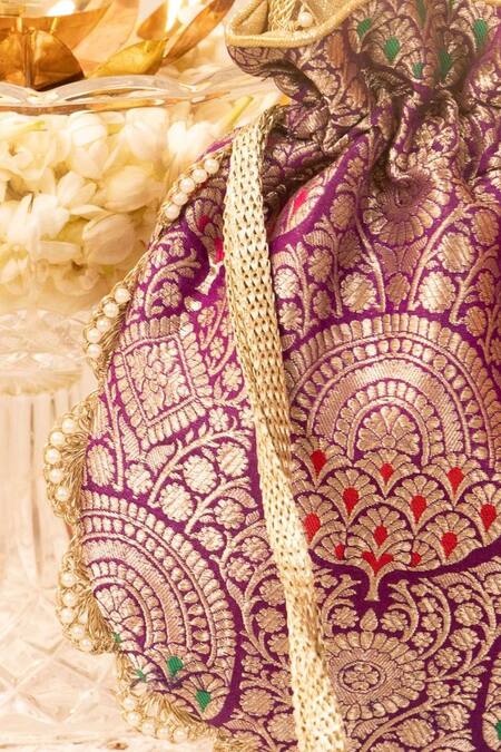 Amyra Purple Pearls, Lace Embellished Banarasi Silk Potli Online at Aza Fashions Amyra_Purple Pearls, Lace Embellished Banarasi Silk Potli _Online_at_Aza_Fashions