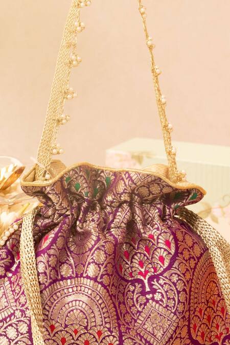 Buy Amyra Purple Pearls, Lace Embellished Banarasi Silk Potli Online at Aza Fashions Buy_Amyra_Purple Pearls, Lace Embellished Banarasi Silk Potli _Online_at_Aza_Fashions