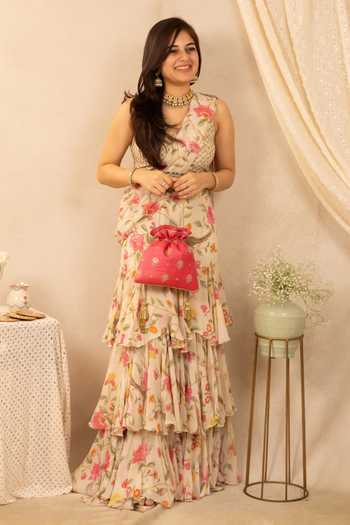 Amyra_Pink Embroidery, Cut Work, Tassels Floral Potli_at_Aza_Fashions