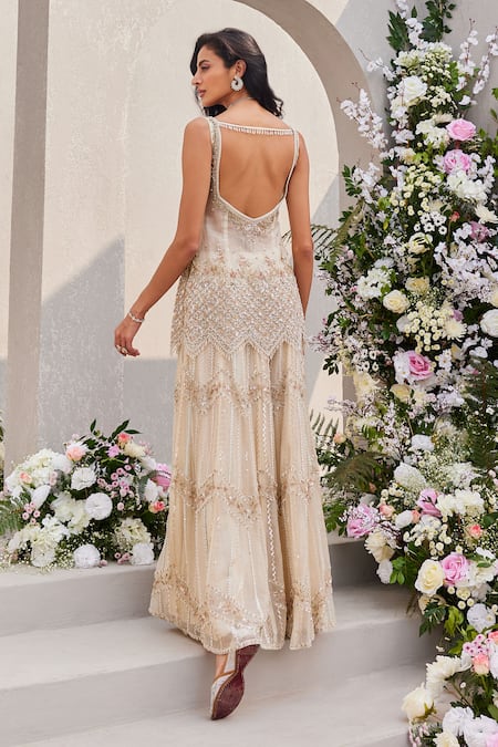 Shop Saisha Ivory Organza Cut Work, Sequins, Zari Split Cutdana Embroidered Peplum Kurta Set at Aza Fashions Shop_Saisha_Ivory Organza Cut Work, Sequins, Zari Split Cutdana Embroidered Peplum Kurta Set _at_Aza_Fashions