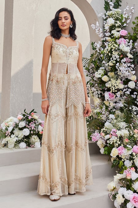 Saisha Ivory Organza Cut Work, Sequins, Zari Split Cutdana Embroidered Peplum Kurta Set Online at Aza Fashions Saisha_Ivory Organza Cut Work, Sequins, Zari Split Cutdana Embroidered Peplum Kurta Set _Online_at_Aza_Fashions
