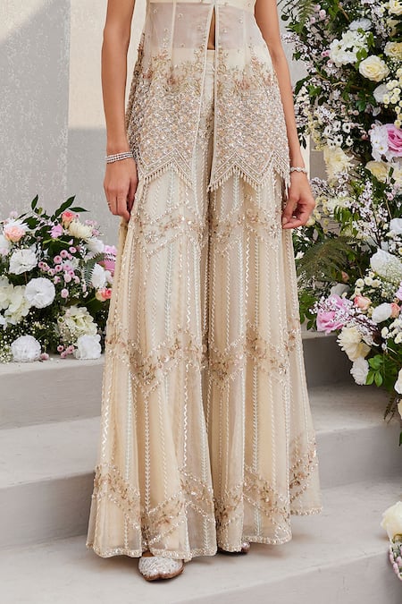 Buy Saisha Ivory Organza Cut Work, Sequins, Zari Split Cutdana Embroidered Peplum Kurta Set Online at Aza Fashions Buy_Saisha_Ivory Organza Cut Work, Sequins, Zari Split Cutdana Embroidered Peplum Kurta Set _Online_at_Aza_Fashions