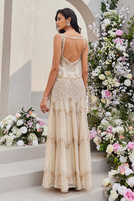 Shop Saisha Ivory Organza Cut Work, Sequins, Zari Split Cutdana Embroidered Peplum Kurta Set Online at Aza Fashions Shop_Saisha_Ivory Organza Cut Work, Sequins, Zari Split Cutdana Embroidered Peplum Kurta Set _Online_at_Aza_Fashions