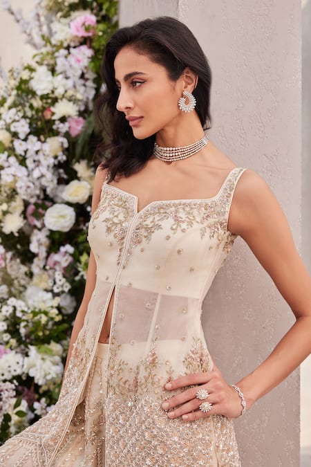 Saisha Ivory Organza Cut Work, Sequins, Zari Split Cutdana Embroidered Peplum Kurta Set at Aza Fashions Saisha_Ivory Organza Cut Work, Sequins, Zari Split Cutdana Embroidered Peplum Kurta Set _at_Aza_Fashions