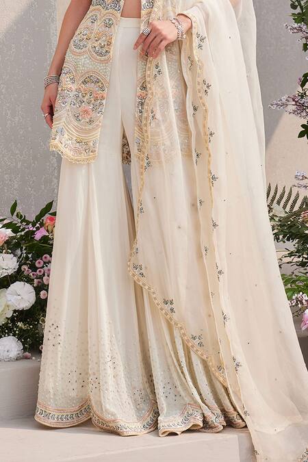 Saisha_Ivory Organza, Georgette Cut Work, Sequins, Floral Peplum Kurta Sharara Set _Online_at_Aza_Fashions