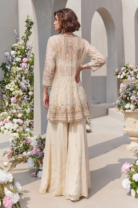 Shop Saisha Ivory Organza, Georgette Pearls, Cut Embroidered High-low Kurta And Sharara Set at Aza Fashions Shop_Saisha_Ivory Organza, Georgette Pearls, Cut Embroidered High-low Kurta And Sharara Set _at_Aza_Fashions