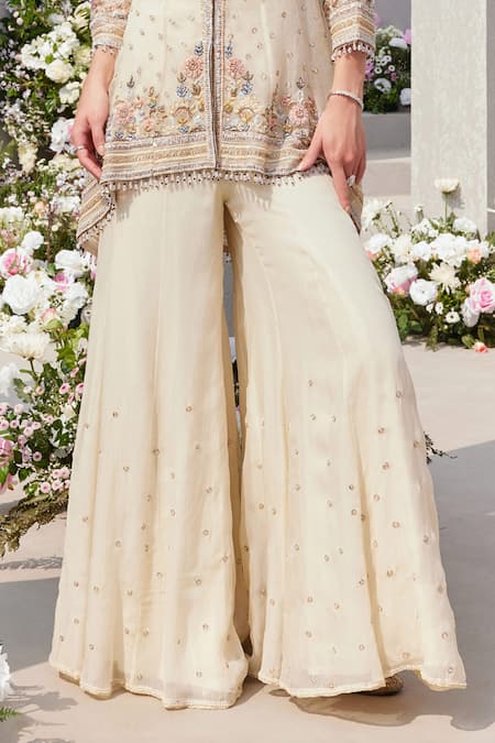 Saisha Ivory Organza, Georgette Pearls, Cut Embroidered High-low Kurta And Sharara Set Online at Aza Fashions Saisha_Ivory Organza, Georgette Pearls, Cut Embroidered High-low Kurta And Sharara Set _Online_at_Aza_Fashions