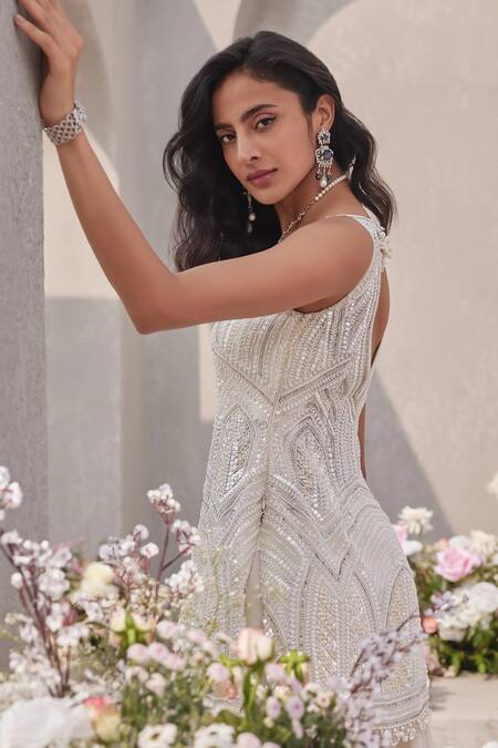 Saisha Ivory Organza Sequins, Cut Work, Tassels, Embellished Peplum Kurta Sharara Set at Aza Fashions Saisha_Ivory Organza Sequins, Cut Work, Tassels, Embellished Peplum Kurta Sharara Set _at_Aza_Fashions