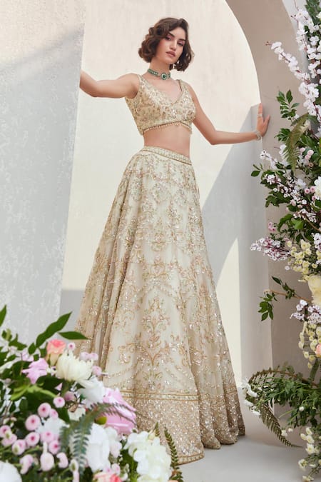 Saisha_Ivory Organza Tassels, Cut Work, Sequins, Floral Jaali 3d Lehenga Set _Online_at_Aza_Fashions