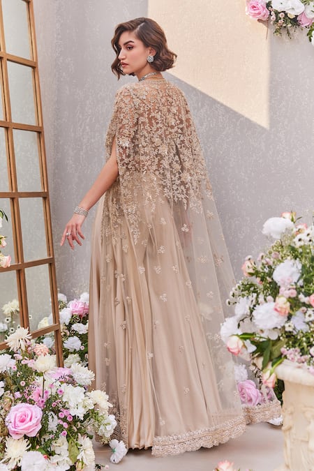 Shop Saisha Beige Satin Sequins, Cut Work Sweetheart Neck Dori Embroidered Cape Sharara Set at Aza Fashions Shop_Saisha_Beige Satin Sequins, Cut Work Sweetheart Neck Dori Embroidered Cape Sharara Set _at_Aza_Fashions