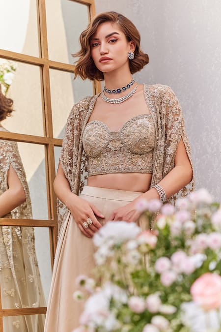 Shop Saisha Beige Satin Sequins, Cut Work Sweetheart Neck Dori Embroidered Cape Sharara Set Online at Aza Fashions Shop_Saisha_Beige Satin Sequins, Cut Work Sweetheart Neck Dori Embroidered Cape Sharara Set _Online_at_Aza_Fashions