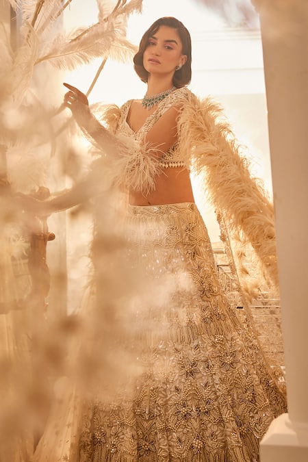 Swish By Dolcy And Simran_Ivory Net Pearls, Cut Work, Sequins Sweetheart Floral Embroidered Lehenga Set _Online_at_Aza_Fashions