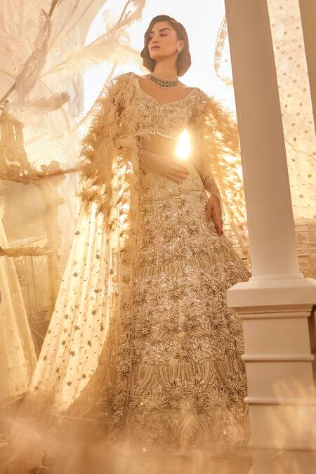 Shop_Swish By Dolcy And Simran_Ivory Net Pearls, Cut Work, Sequins Sweetheart Floral Embroidered Lehenga Set _Online_at_Aza_Fashions