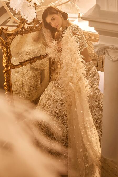 Swish By Dolcy And Simran_Ivory Net Pearls, Cut Work, Sequins Sweetheart Floral Embroidered Lehenga Set _at_Aza_Fashions