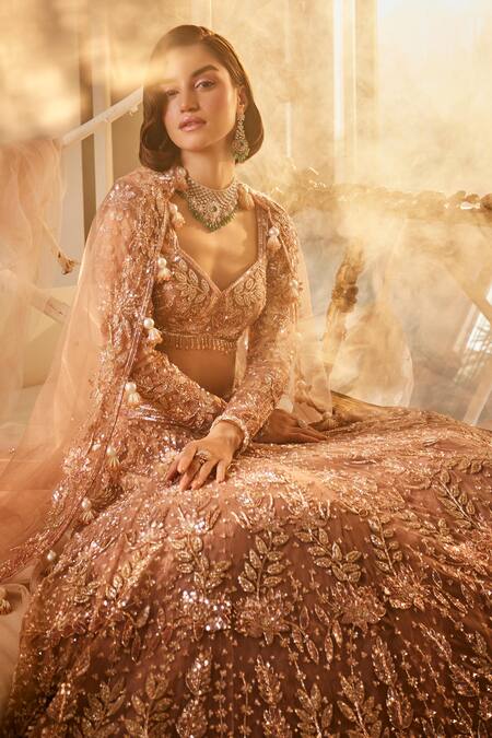 Buy Swish By Dolcy And Simran Rose Gold Net Tassels, Embroidery Sweetheart Neck Cutdana Bridal Lehenga Set Online at Aza Fashions Buy_Swish By Dolcy And Simran_Rose Gold Net Tassels, Embroidery Sweetheart Neck Cutdana Bridal Lehenga Set _Online_at_Aza_Fashions