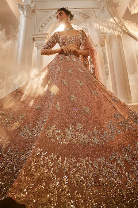 Buy_Swish By Dolcy And Simran_Rose Gold Net Tassels, Cut Work, Sequins, Embroidery, Pearls Nakshi Lehenga Set _Online_at_Aza_Fashions