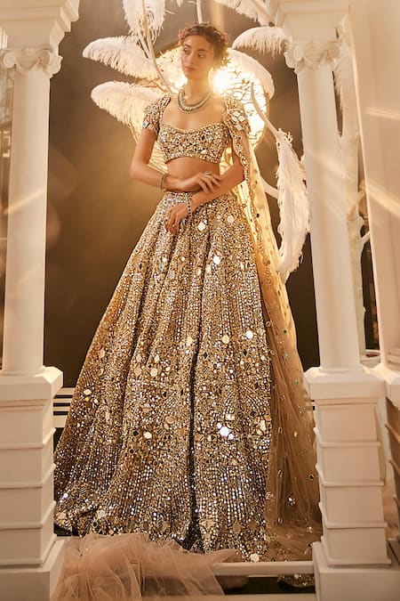 Shop_Swish By Dolcy And Simran_Gold Net Tassels, Cut Work, Mirrors, Embroidery Mirrorwork Bridal Lehenga Set _Online_at_Aza_Fashions