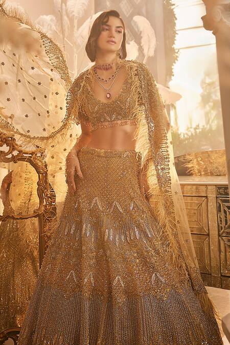 Swish By Dolcy And Simran_Gold Net Crystals, Sequins, Cut Work, Cutdana Embroidered Bridal Lehenga Set _Online_at_Aza_Fashions