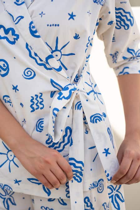 Merakus_White Cotton, Poplin V-neck Doodle Print Wrap Jacket And Pant Set _at_Aza_Fashions