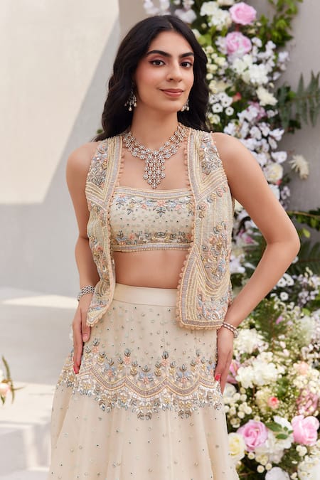 Shop Saisha Ivory Organza Cut Work, Pearls, Zari, Embroidery Zardozi Lehenga And Gilet Set Online at Aza Fashions Shop_Saisha_Ivory Organza Cut Work, Pearls, Zari, Embroidery Zardozi Lehenga And Gilet Set _Online_at_Aza_Fashions