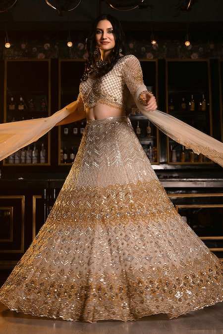Ronak And Shruti Gold Organza, Net Crystals, Cut Work, Sequins Ivory Embellished Lehenga Set at Aza Fashions Ronak And Shruti_Gold Organza, Net Crystals, Cut Work, Sequins Ivory Embellished Lehenga Set _at_Aza_Fashions