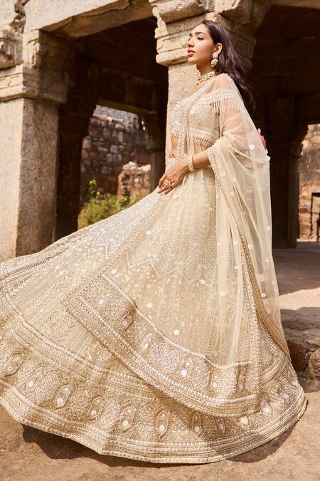 Shop Ronak And Shruti Ivory Net Sequins, Beads Sweetheart Neck Glass Embroidered Bridal Lehenga Set Online at Aza Fashions Shop_Ronak And Shruti_Ivory Net Sequins, Beads Sweetheart Neck Glass Embroidered Bridal Lehenga Set _Online_at_Aza_Fashions