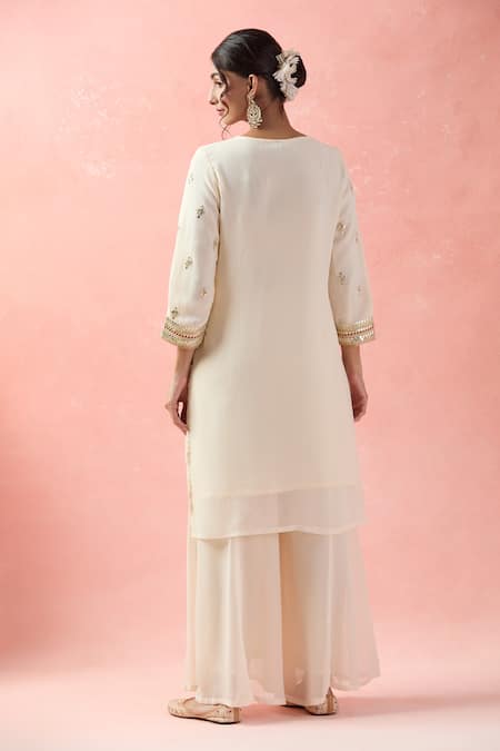 Shop Samyukta Singhania Cream Georgette, Silk Gota Patti, Straight Kurta Set With Bandhani Dupatta at Aza Fashions Shop_Samyukta Singhania_Cream Georgette, Silk Gota Patti, Straight Kurta Set With Bandhani Dupatta_at_Aza_Fashions