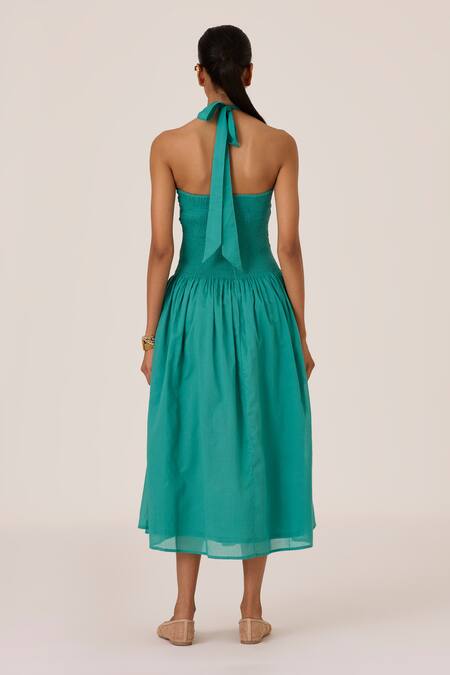 Shop The Summer House Blue Cotton Halter Neck Cyan Pleated Smocked Midi Dress at Aza Fashions Shop_The Summer House_Blue Cotton Halter Neck Cyan Pleated Smocked Midi Dress_at_Aza_Fashions