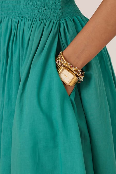 The Summer House Blue Cotton Halter Neck Cyan Pleated Smocked Midi Dress at Aza Fashions The Summer House_Blue Cotton Halter Neck Cyan Pleated Smocked Midi Dress_at_Aza_Fashions