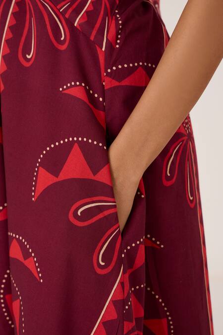 The Summer House_Maroon Chanderi Halter Neck Rivulet Palm Print Maxi Dress _at_Aza_Fashions