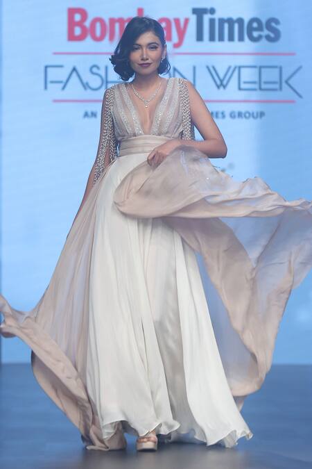 Babita Malkani Ivory Chiffon Pearls Plunge Neck Tassel Embellished Maxi Dress Online at Aza Fashions Babita Malkani_Ivory Chiffon Pearls Plunge Neck Tassel Embellished Maxi Dress _Online_at_Aza_Fashions