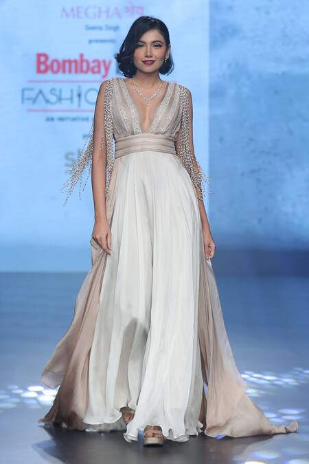 Babita Malkani Ivory Chiffon Pearls Plunge Neck Tassel Embellished Maxi Dress at Aza Fashions Babita Malkani_Ivory Chiffon Pearls Plunge Neck Tassel Embellished Maxi Dress _at_Aza_Fashions