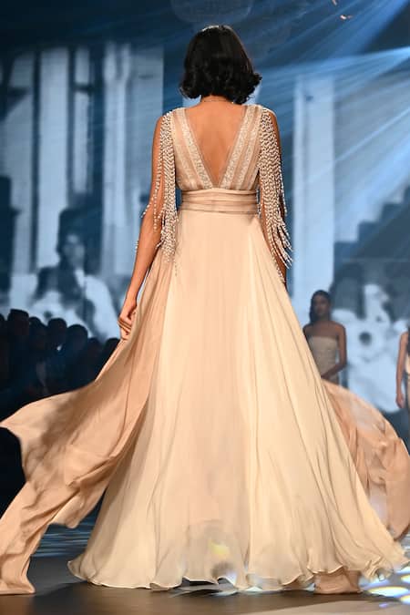 Shop Babita Malkani Ivory Chiffon Pearls Plunge Neck Tassel Embellished Maxi Dress at Aza Fashions Shop_Babita Malkani_Ivory Chiffon Pearls Plunge Neck Tassel Embellished Maxi Dress _at_Aza_Fashions