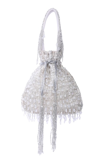 Tasna_White Cut Work, Pearls, Tassels Cutdana Embellished Potli _at_Aza_Fashions