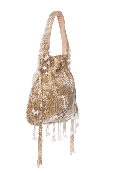 Tasna_Gold Cut Work, Pearls, Tassels Cutdana Embellished Potli _at_Aza_Fashions