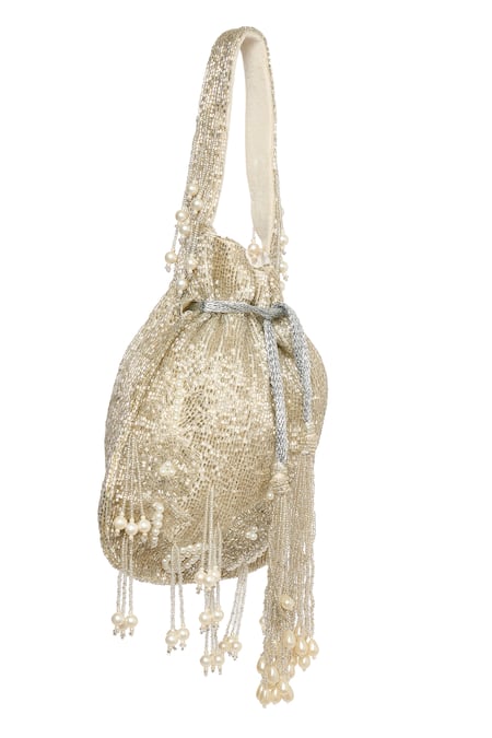 Tasna_Silver Cut Work, Pearls, Tassels Cutdana And Potli _Online_at_Aza_Fashions