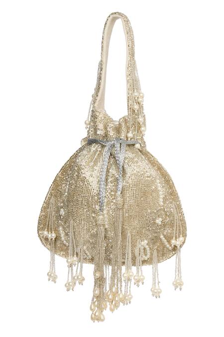 Buy_Tasna_Silver Cut Work, Pearls, Tassels Cutdana And Potli _Online_at_Aza_Fashions