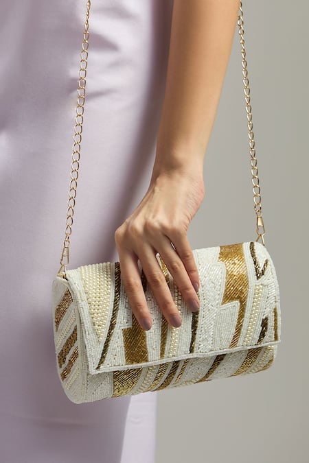 Tasna_Gold Cut Work, Pearls And White Cutdana Clutch Bag _at_Aza_Fashions