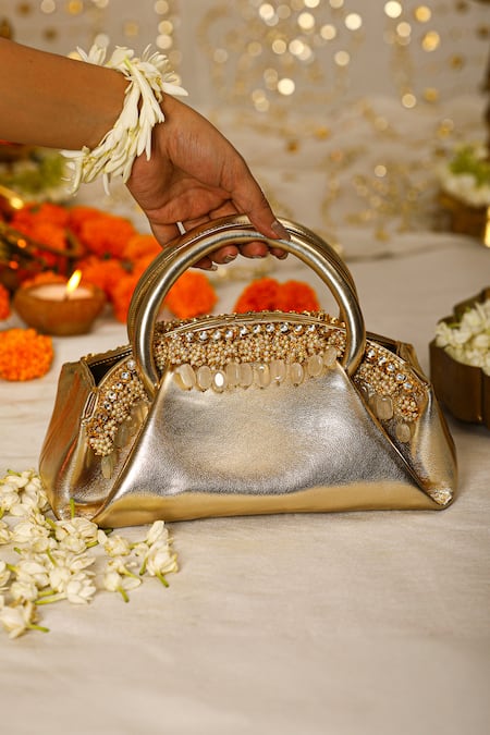 Shop 5elements Gold Pearls, Crystals, Beads Tassel Handbag at Aza Fashions Shop_5elements_Gold Pearls, Crystals, Beads Tassel Handbag _at_Aza_Fashions