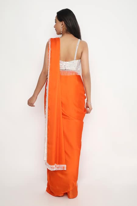 Shop Neha Mehra Orange Satin Crystals Tassel Embellished Saree at Aza Fashions Shop_Neha Mehra_Orange Satin Crystals Tassel Embellished Saree _at_Aza_Fashions