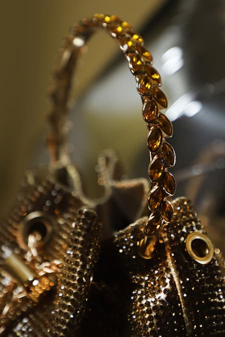 Be Chic_Gold Crystals, Tassels Embellished Potli _Online_at_Aza_Fashions