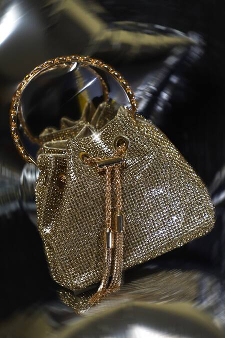 Buy_Be Chic_Gold Crystals, Tassels Embellished Potli _Online_at_Aza_Fashions